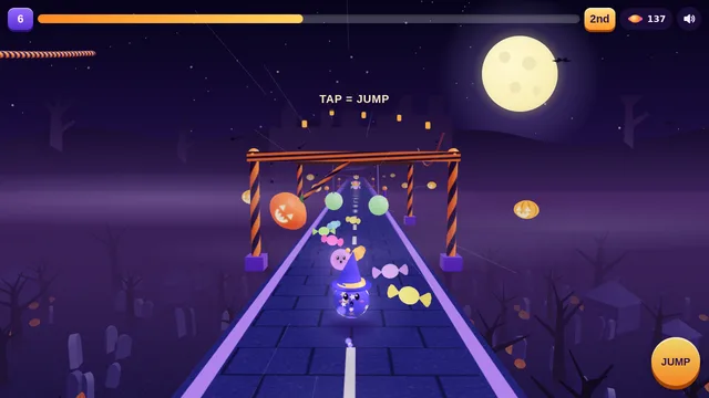 Free online 3D Halloween ball race game with a glowing ghost ball on a floating track above a graveyard under a full moon